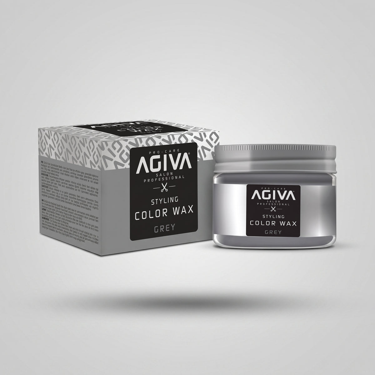 Agiva Color Wax Grey styling-hårvoks i sølvfarvet krukke ved siden af emballage med grå mønstret æske.